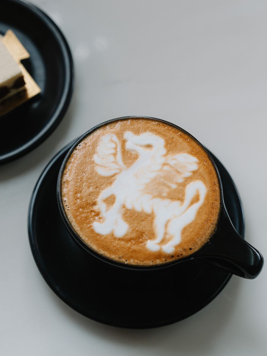 A latte with latte art at Momento Café